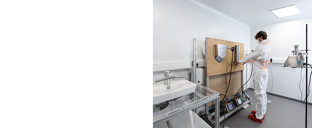 Preizkušanje aerosolizacije sušilnikov za roke Dyson AirbladeTM